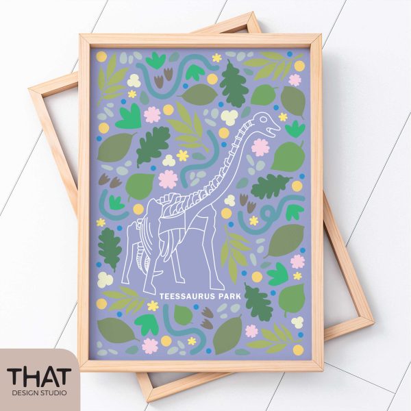 A Teesaurus dinosaur park print with a purple background. It is in a wooden frame, resting on a white background.